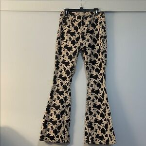 Rock and Roll cowprint flare pants.